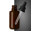 Dark brown transparent glass medical dropper bottle Royalty Free Stock Photo