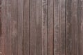 Dark brown weathered wooden fence Royalty Free Stock Photo