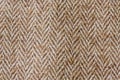 Dark brown herringbone fabric swatch.