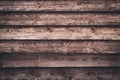 Dark brown wood. Cracked wooden texture. Old timber background. Shabby oak fence, desk surface. Natural color. Weathered planks. A Royalty Free Stock Photo