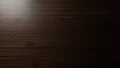 Dark brown wood grain texture with subtle light reflection Royalty Free Stock Photo
