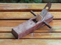 Dark brown wood plane, planer Royalty Free Stock Photo