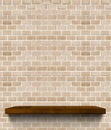 Dark brown Wooden shelf on regular light orange brick wall,Template mock up for display of product,Business presentation