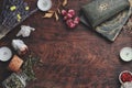 Dark brown wooden table background for text, decorated with witchy wiccan items to look esoteric and occult Royalty Free Stock Photo