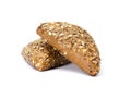 Dark buns with sunflower seeds, sesame and flax. White background