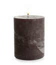 Dark burning decorative candle isolated