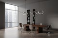 Dark business room interior with meeting table and chairs, panoramic window Royalty Free Stock Photo