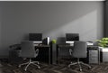 Dark business room interior with two seats, table with pc, mockup Royalty Free Stock Photo