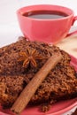 Dark cake with chocolate, cocoa and plum jam, cup of coffee, delicious dessert Royalty Free Stock Photo