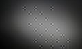 Dark carbon fiber background showing diagonal weave pattern Royalty Free Stock Photo