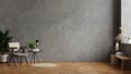 Dark chair and a wooden table in living room interior with plant,concrete wall