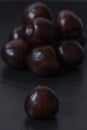 Dark cherries on black background Royalty Free Stock Photo