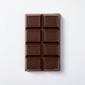 A dark chocolate bar with eight rectangular segments, arranged in two columns and four Royalty Free Stock Photo
