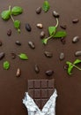 Dark chocolate bar with peppermint and cocoa beans Royalty Free Stock Photo