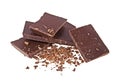 Dark chocolate bars with crushed pieces on white background Royalty Free Stock Photo