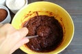 Dark Chocolate Cake Batter Being Mixed in a Bowl