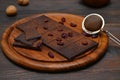 Dark chocolate with cranberries on a wooden board Royalty Free Stock Photo