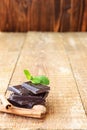 Dark chocolate with mint leaf and cinnamon Royalty Free Stock Photo