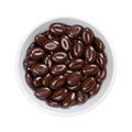 Dark chocolate mocha beans, candies with coffee flavor, in white bowl