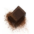 Dark chocolate piece on cocoa powder isolated on white background Royalty Free Stock Photo