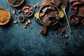 Dark chocolate pieces crushed and cocoa beans, culinary background Royalty Free Stock Photo