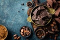 Dark chocolate pieces crushed and cocoa beans, culinary background Royalty Free Stock Photo