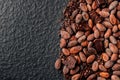 Dark chocolate pieces crushed and cocoa beans, top view Royalty Free Stock Photo