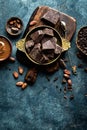 Dark chocolate pieces crushed and cocoa beans. Chocolate background Royalty Free Stock Photo