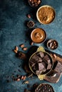 Dark chocolate pieces crushed and cocoa beans. Chocolate background Royalty Free Stock Photo