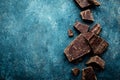 Dark chocolate pieces crushed on a dark background Royalty Free Stock Photo