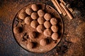 Dark chocolate truffles on the black background Royalty Free Stock Photo