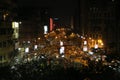 Dark city traffic blurred in motion at late evening on crowded streets in Kolkata