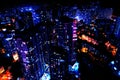 Dark cityscape with beautiful neon lights. Modern metropolis