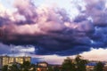 Dark clouds above the city before thunderstorm. Picture of approaching storm Royalty Free Stock Photo