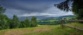 Dark clouds above a mountain range Royalty Free Stock Photo