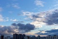 Dark clouds in the blue sky above the city Royalty Free Stock Photo