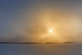 Dark clouds and bright sunlit sky