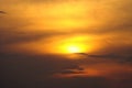 Dark clouds on an orange yellow sky. Sunset background Royalty Free Stock Photo