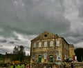 Dark clouds over the Baptist Church at Haworth