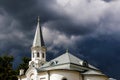 Dark clouds over church Royalty Free Stock Photo
