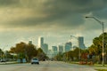 Dark clouds over the highway at dusk Royalty Free Stock Photo