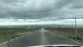 Storm clouds over the roads and human buildings