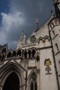 Dark clouds of the Royal Courts of Justice in central London Royalty Free Stock Photo