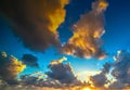Dark clouds and shining sun at sunset Royalty Free Stock Photo