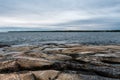 Dark clouds and wild rocks at the coastline of the Baltic Sea Royalty Free Stock Photo
