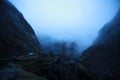 Dark and cloudy Norwegian morning. Rain in Norway. Fog in the mountains. Languid mountains. Stones. Boulder. Rock. Waterfalls in t