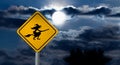 Full Moon in the Night Sky and Witch Road Sign