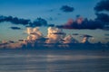 Dark cloudy tropical sky at sunset background. Stormy cloudy sky. Big cloud above ocean. Royalty Free Stock Photo