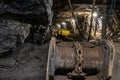 Dark coal mine tunnel with minimal light, showing deep stope and active coal extraction. Royalty Free Stock Photo