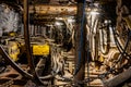 Dark coal mine tunnel with minimal light, showing deep stope and active coal extraction. Royalty Free Stock Photo